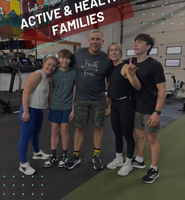 Active family smiling together inside City Fit Shop gym in Edmonton Alberta